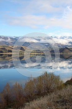 Mountains reflected in Lake Dunstan New Zealand