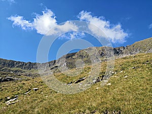 Mountains ridge under blue sky