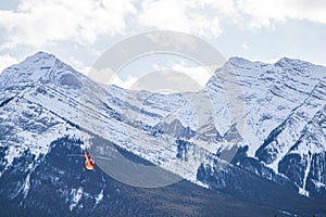 Mountains in the Rockies and a helicopter