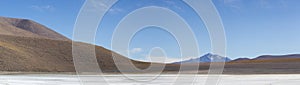 Mountains and salt pan in Eduardo Avaroa Reserve, Bolivia photo