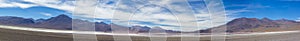 Mountains and salt pan in Eduardo Avaroa Reserve, Bolivia photo