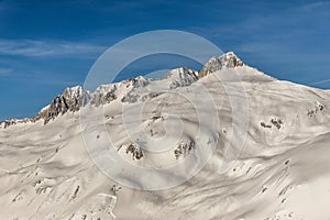 Mountains scenes at Ski resorts Andermatt and Sedrun in Switzerland