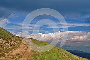 Mountain landscape and storm clouds - Baiului Mountains, landmark attraction in Romania