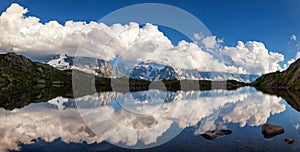 Mountains and sky reflected in Lac De Cheserys