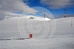 The mountains, snow and clouds.