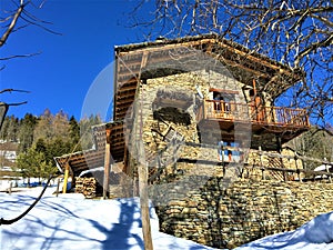 Mountains, snow, and fairytale house