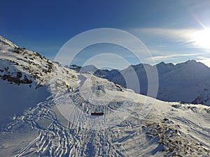 Mountains, snow and natural landscape, blue sky with sunshine, travel and adventure in winter with Earth. Arctic, alps