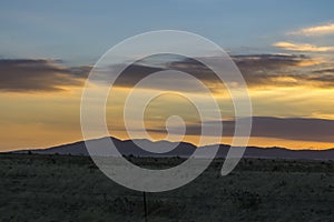 Mountains with a sunset sky