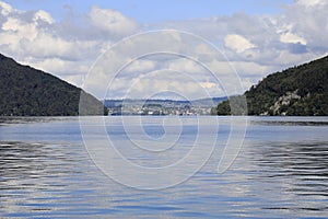 The mountains surround the lake