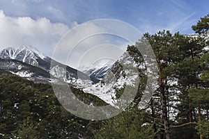 Mountains and town of Espot snowy in winter. photo