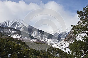 Mountains and town of Espot snowy in winter. photo