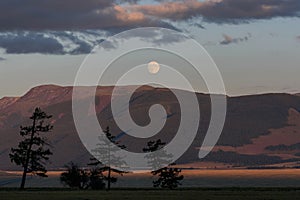 Mountains trees moon sunset clouds