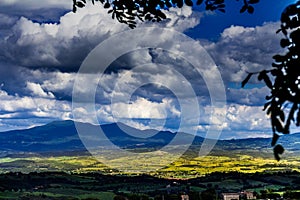 Mountains of Tuscany. Landscape of a cultivated grasslands.