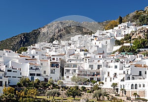 Frigiliana with mountains photo