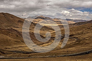 Mountains and winding roads in Saga County, Xigaze City, Tibet, China