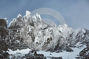 Mountains in winter, ice on cliffs