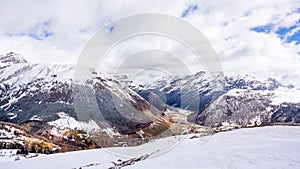 Mountains in winter, slopes and pistes, Livigno village, Italy, Alps photo