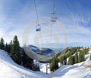 Mountainside chairlift photo