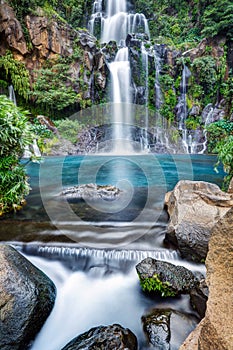 Mountainside waterfall photo