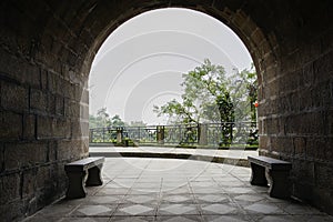 Mountaintop arched gateway in winter afternoon