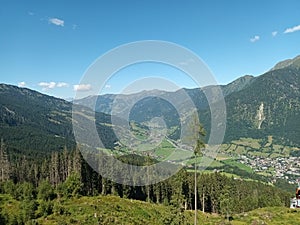 Mountainview Austria Bad Hofgastein with green forest and blue Sky