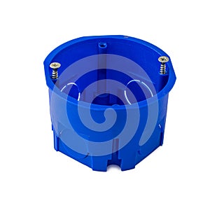 Mounting box for installing outlets. Box for mounting sockets on a white background. Round blue plastic socket, wall box for