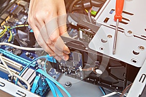 Mounting computer hard drive inside system unit.