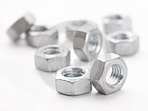 Mounting nut for bolts made of steel