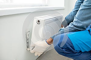 Mounting water heating radiator
