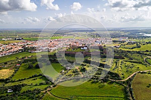 Mourao drone aerial view of castle and village in Alentejo landscape, Portugal photo