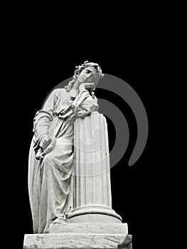 Mournful nineteenth century female cemetery statue photo