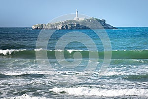 Mouro lighthouse from El Puntal, bay of Santander, Spain