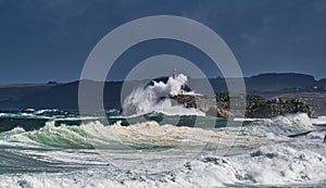 Mouro lighthouse and waves
