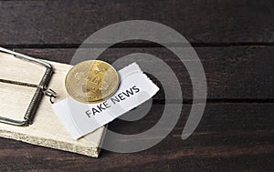 Mouse trap, bitcoin and the word: fake news.