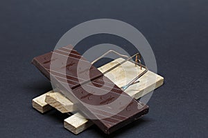 mouse trap with a chocolate bait