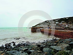 Mousehole is a village and fishing port