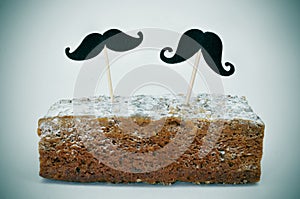 Moustaches in a cake