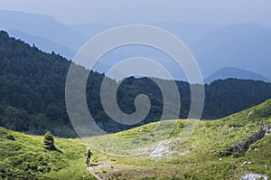 Moutain biker descending from Mozic hill