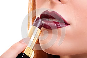 Mouth with dark red lipstick