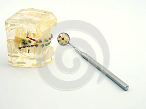 Mouth mirror on white background