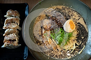 Mouth watering japanese ramen in a bowl served with egg