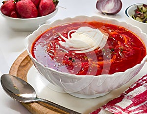 Mouth-watering Ukrainian borsch with sour cream and rye bread