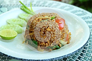 Mouthwatering Thai Dish of Khao Pad Moo or Stirred-fried Rice with pork photo