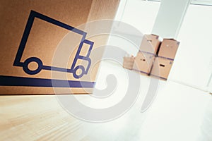 Move. Cardboard, boxes for moving into a new, clean and bright home