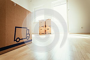 Move. Cardboard, boxes for moving into a new, clean and bright home