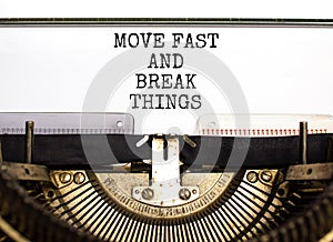 Move fast and break things symbol. Concept words Move fast and break things typed on beautiful old retro typewriter. Beautiful