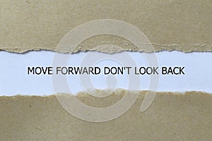 move forward don\'t look back on white paper photo