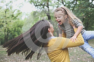 On the move, Mother playing with daughter.