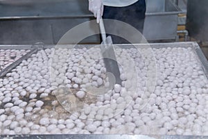 Movement of boiling pork meat balls in hot pot