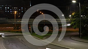 The movement of cars on the city road, car lights, time lapse